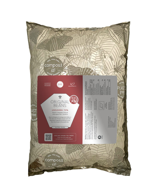 Perlas de chocolate de especialidad. Coberturas de chocolate. Chocolate gourmet. Chocolate reposteria. Chocolate recolectado en la región de Udzungwa, Tanzania . Paquete de 2 Kg. Specialty chocolate covertures from Tanzania.